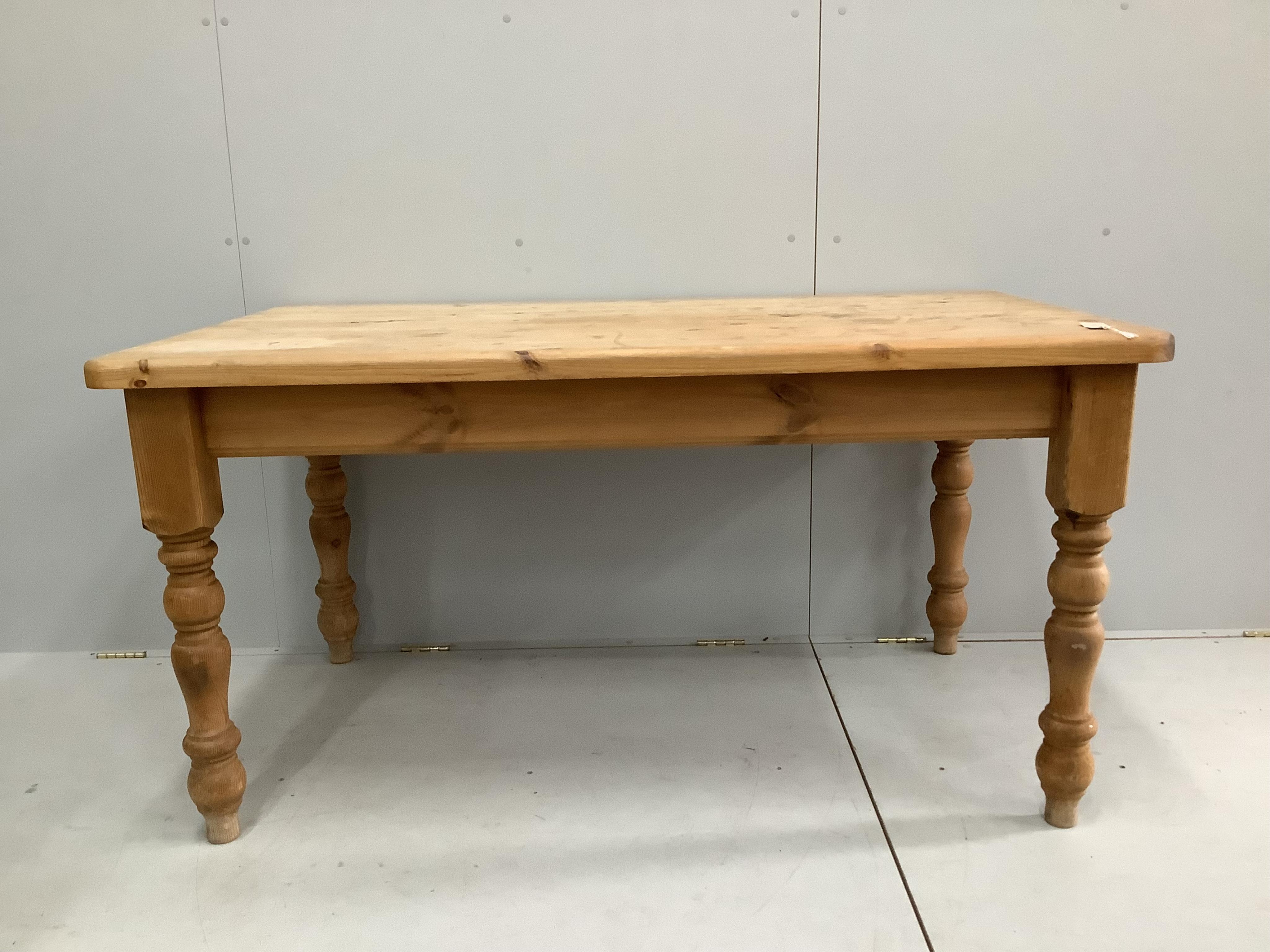 A Victorian style rectangular pine kitchen table, width 150cm, depth 90cm, height 77cm. Condition - fair